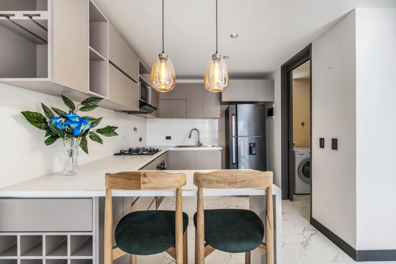 Apartamentos Housy Laureles Medellin Bagian luar foto