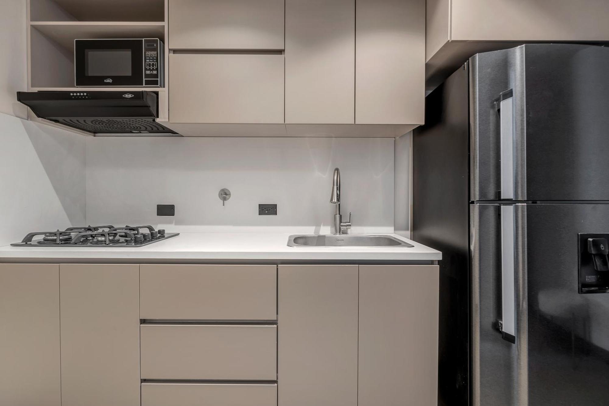 Apartamentos Housy Laureles Medellin Bagian luar foto