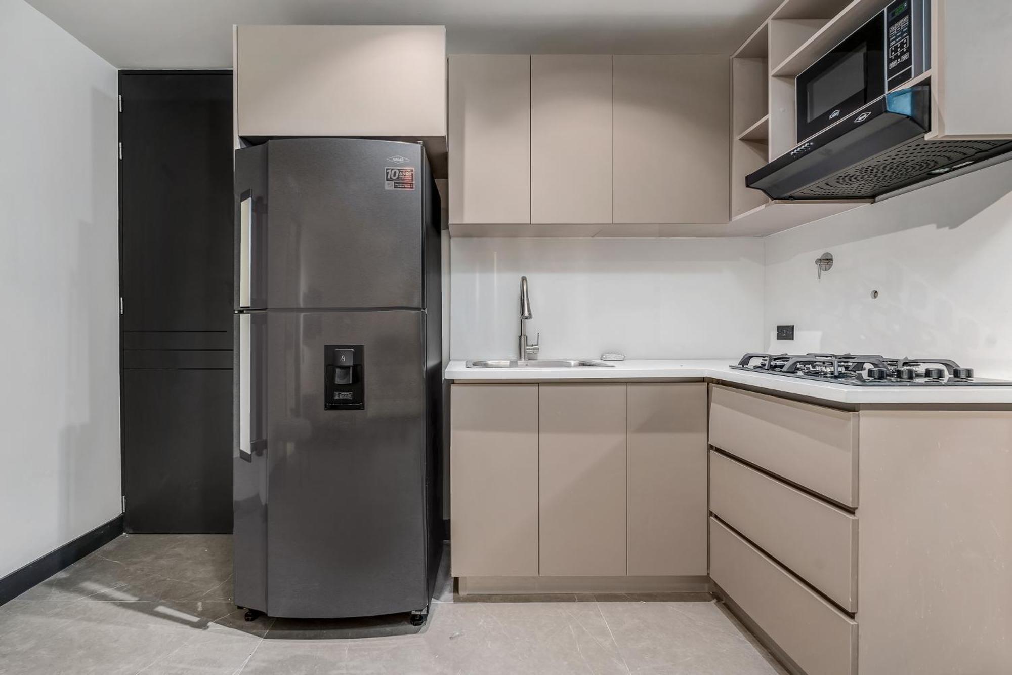 Apartamentos Housy Laureles Medellin Bagian luar foto